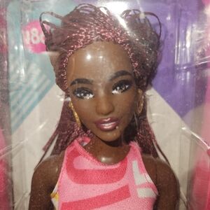 Fashionable Doll with Pink Outfit and Braided Hair